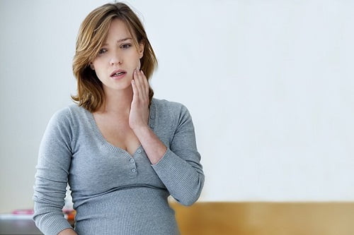 Nhổ răng khôn khi mang thai có nguy hiểm không bác sĩ? 1